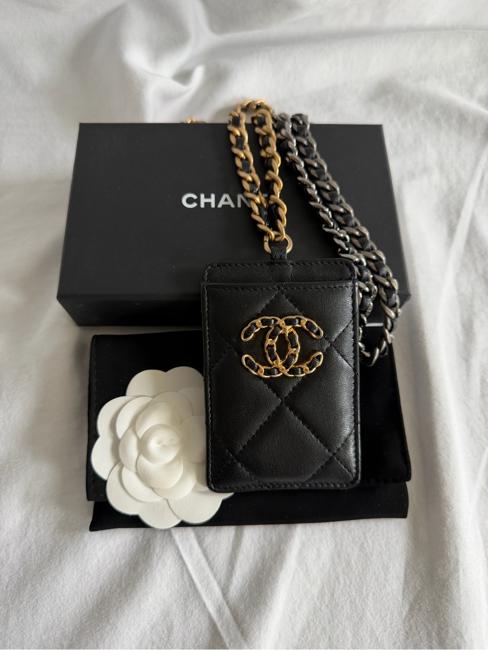 CHANEL Black Quilted Leather Card Holder with Gold CC Chain